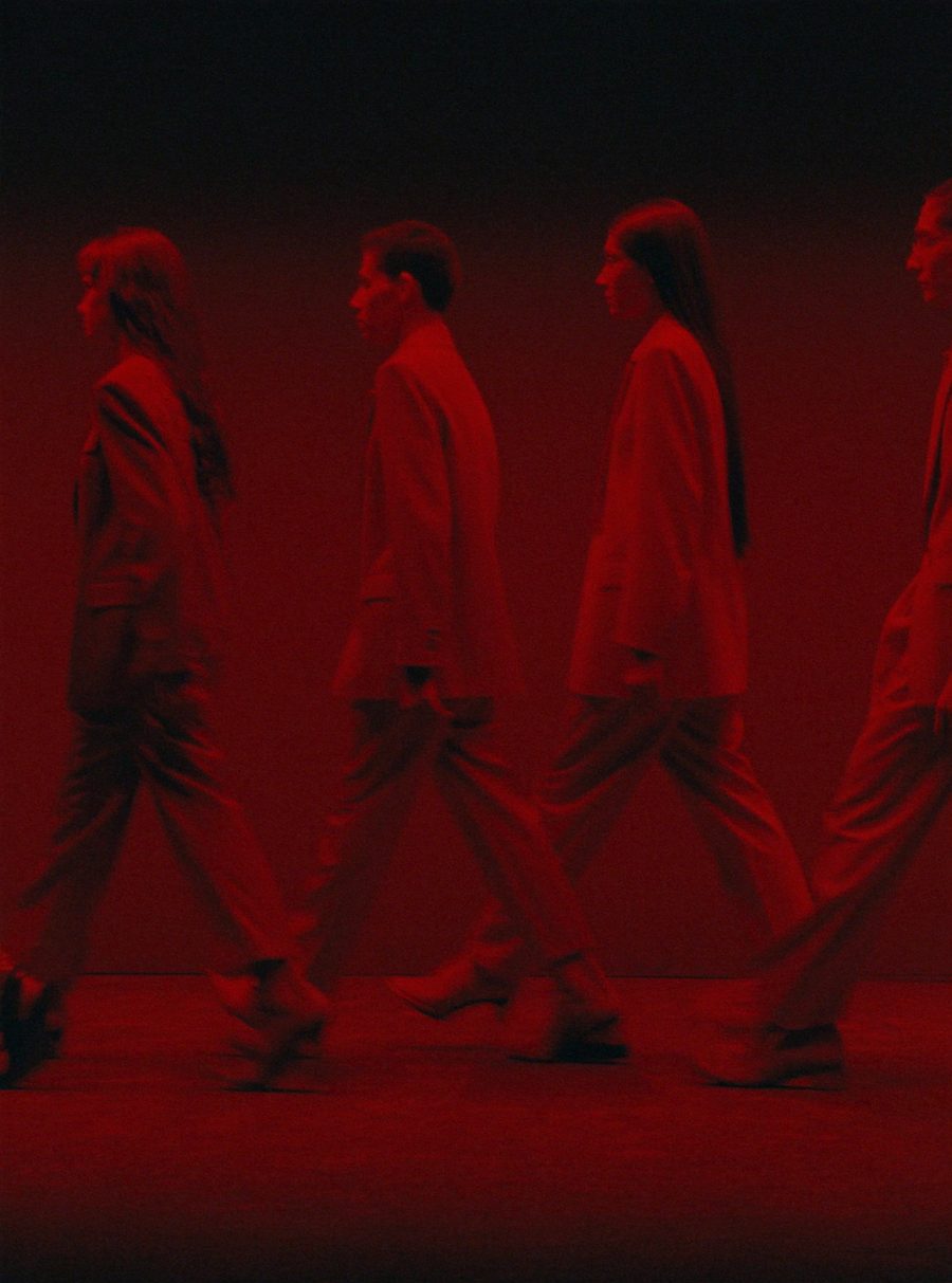 Social and performance — people walking in red light